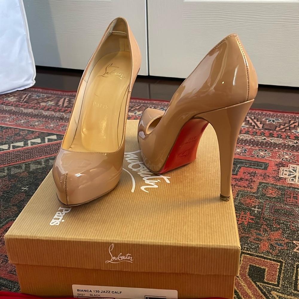 Nude Christian Louboutin heels